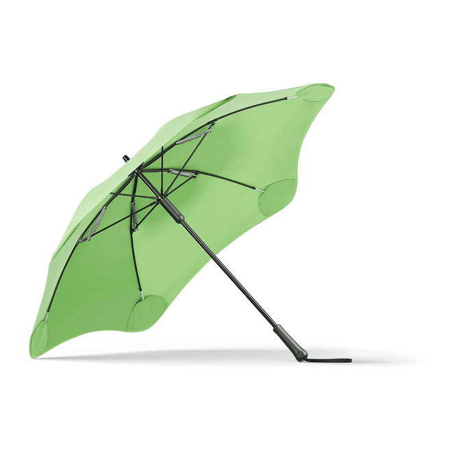 A green BLUNT Classic Umbrella with a unique shape and sturdy black frame, featuring a logo.