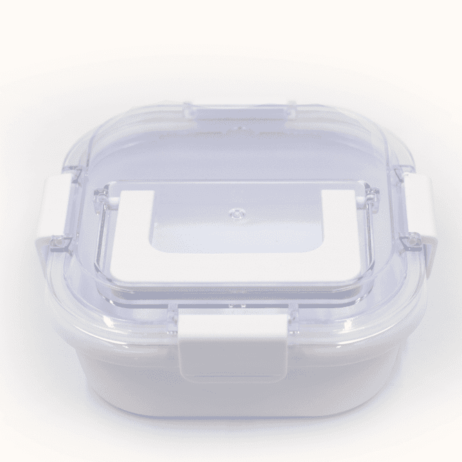 A white and clear lunch box with a secure lid and clip fasteners, designed for food storage.