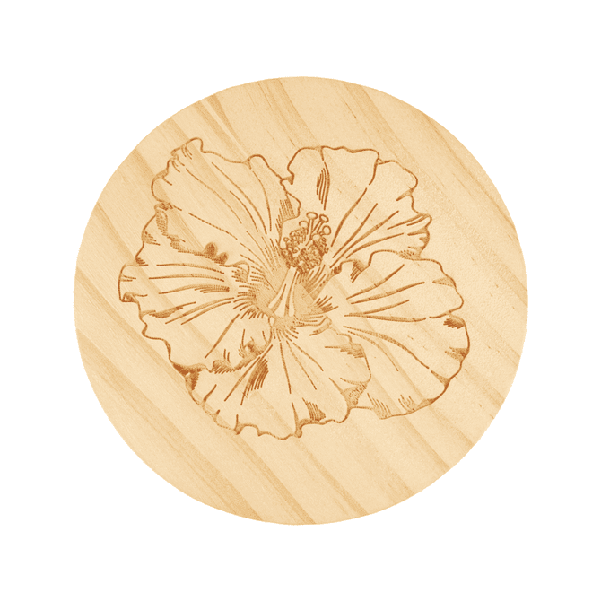 A round wooden coaster featuring an engraved hibiscus flower design. The wood has a natural finish.