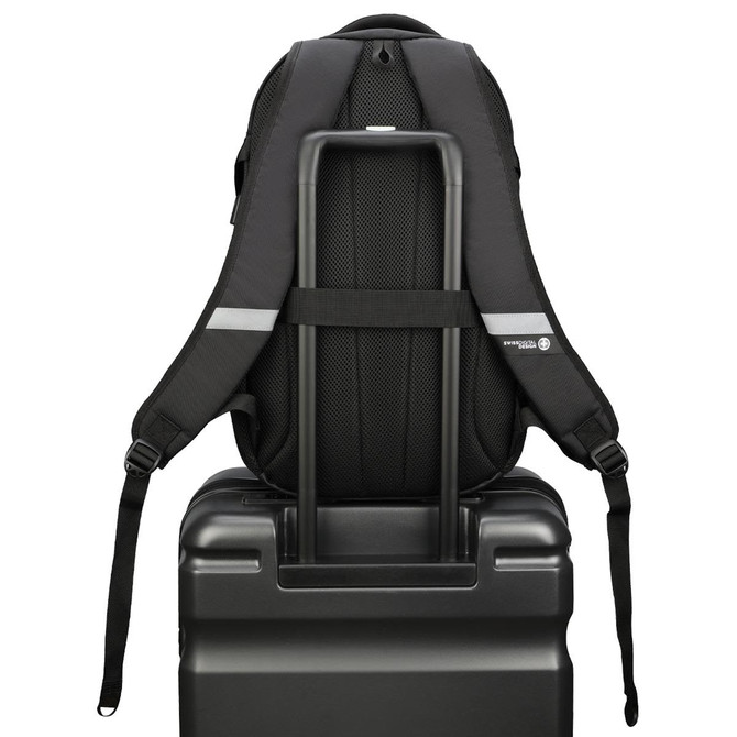 A black backpack displayed on top of a suitcase, featuring adjustable straps and a structured design.