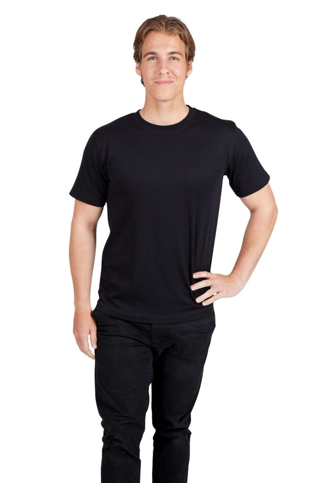 A black modern fit unisex t-shirt displayed on a male model standing with one hand on his hip.