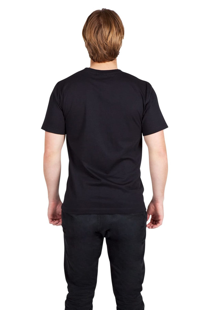 A black modern fit T-shirt worn by a man, with a logo on the shirt. The model stands in profile against a white background.