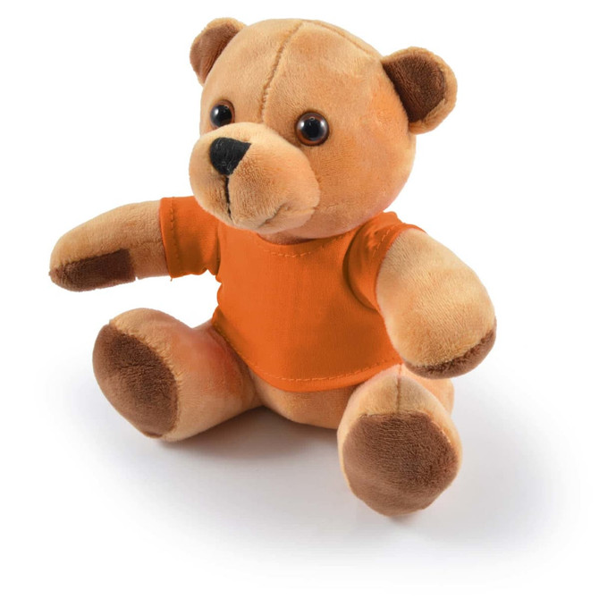 A plush teddy bear named Honey, featuring a soft, light brown body and a cute expression, dressed in an orange shirt.