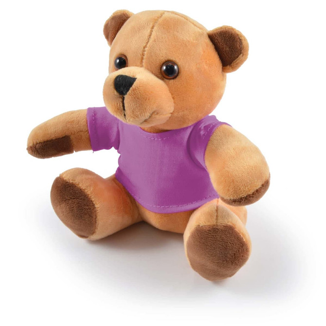 A plush teddy bear in tan with brown accents, wearing a purple shirt, sitting upright.