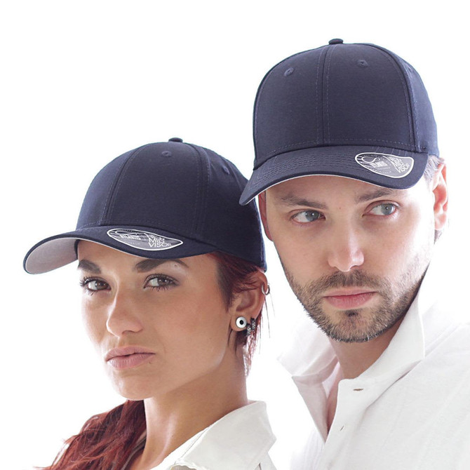 Two individuals are wearing navy blue caps featuring a logo. The caps have a classic design with a curved brim.