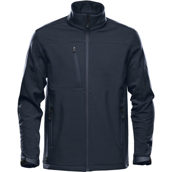 A men's softshell jacket in dark navy, featuring a zippered chest pocket and two side pockets, and a logo.