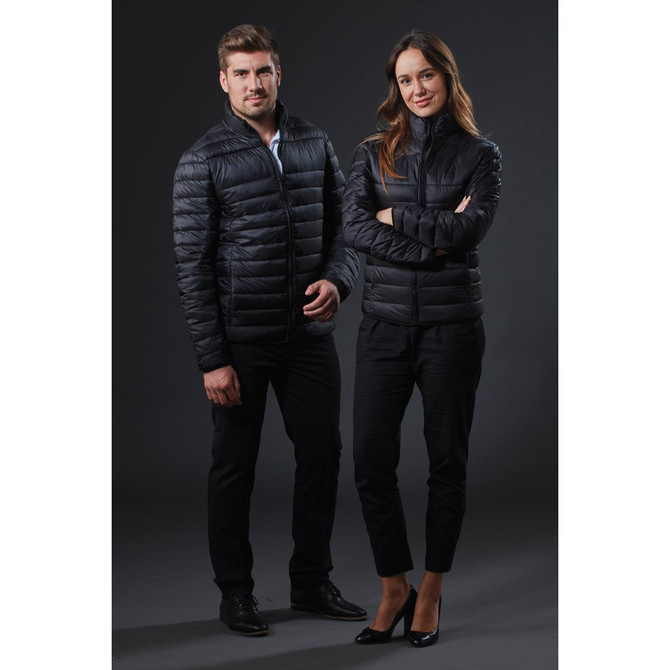 Two models wearing black puffer jackets, standing against a dark background. Each jacket has a logo.