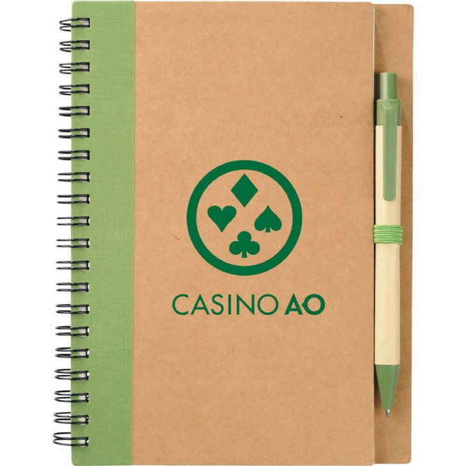A spiral notebook with a green cover and matching pen attached, featuring a logo on the front.