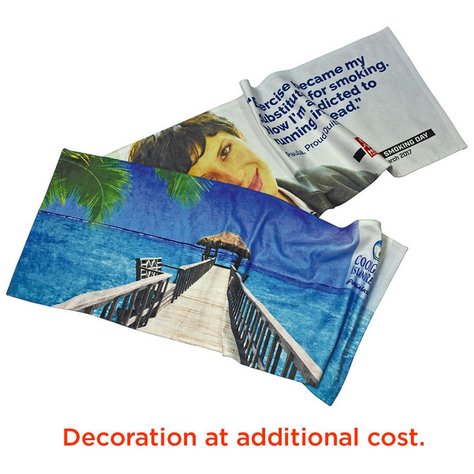 A sublimate sports towel featuring vibrant beach scenery and a person’s image, predominantly in blue and white.