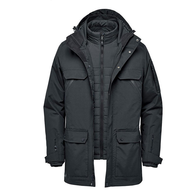 A dark green men's 5-in-1 system jacket featuring multiple pockets and a detachable inner layer. It has a logo.