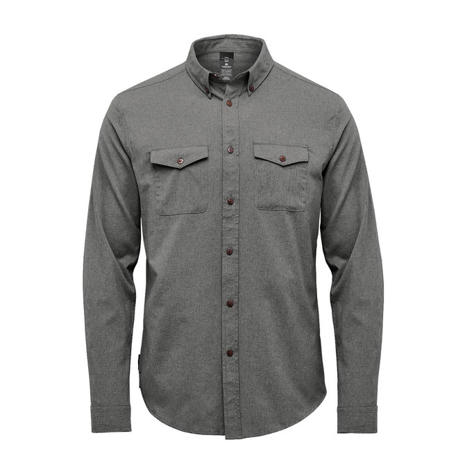 A green long-sleeve men's shirt with buttoned chest pockets and a collar, featuring a logo.