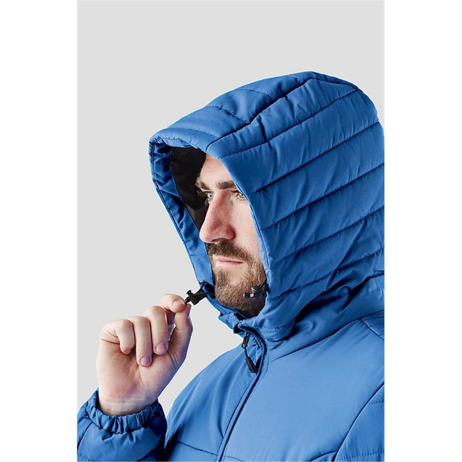 A blue men's quilted hoody featuring a hood and zip closure, with a man adjusting the drawstring.