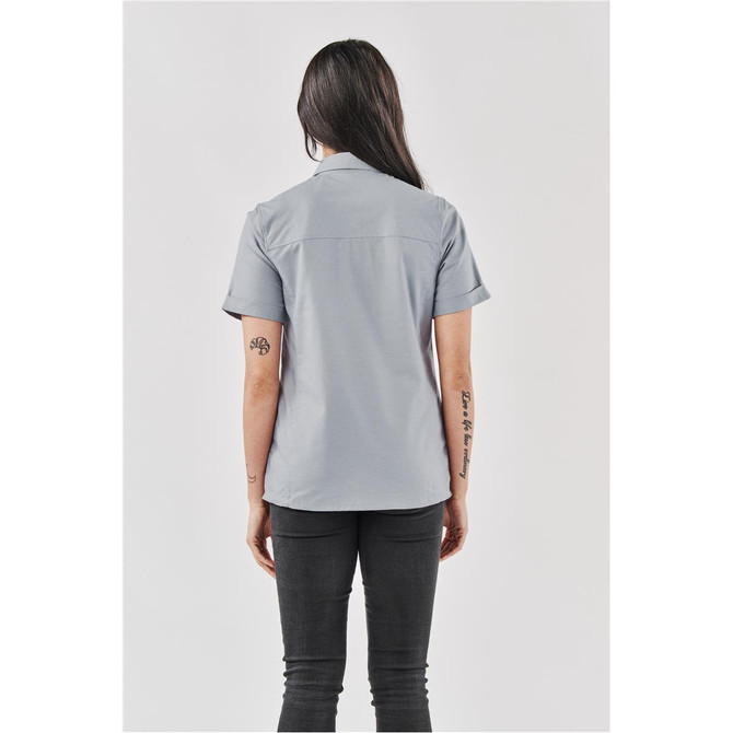 A grey women's button-up shirt displayed from the back, featuring short sleeves and a logo.