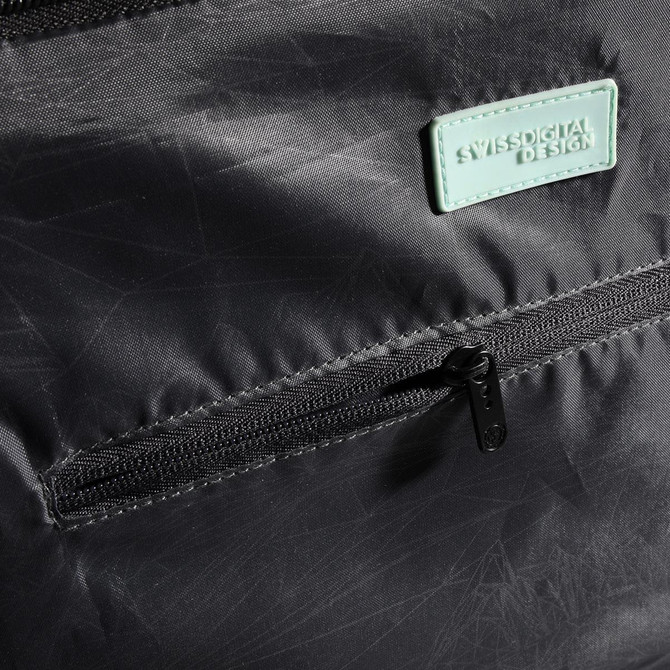 A close-up of the Swissdigital Arosa Duffle Bag in black, featuring a zippered pocket and a branding logo.