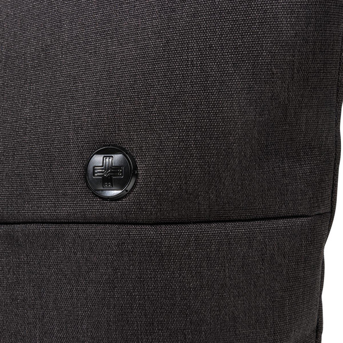 A close-up of a dark grey tote bag featuring a branded logo on the front.
