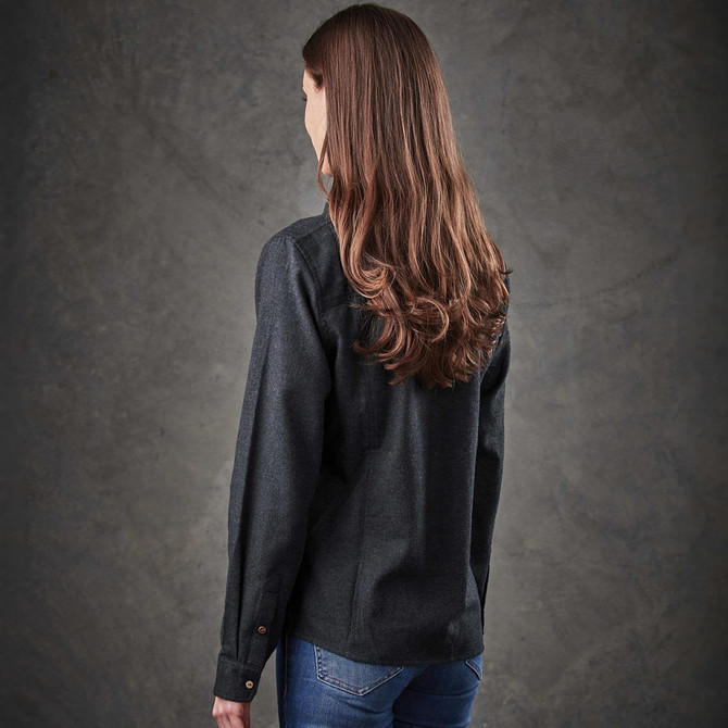 A black button-up shirt with long sleeves, seen from the back, worn by a woman with long hair.