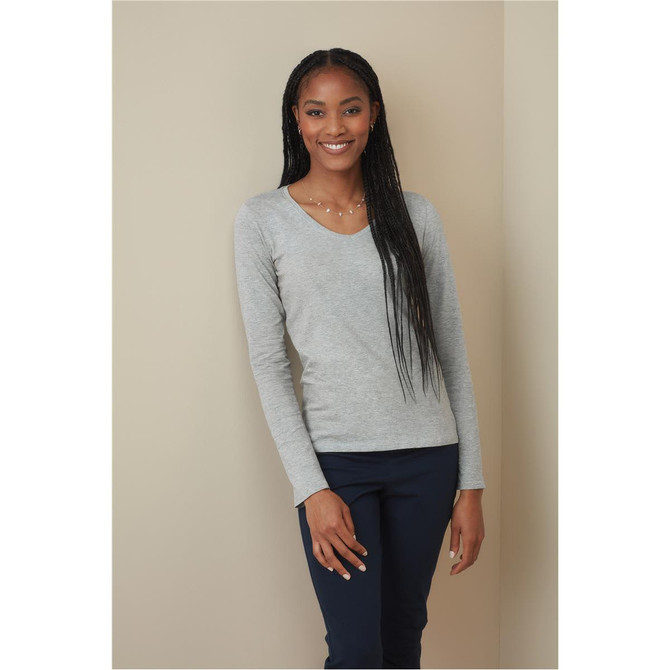 A grey long sleeve shirt with a V-neck, worn by a model with long, straight hair. Features a subtle logo.
