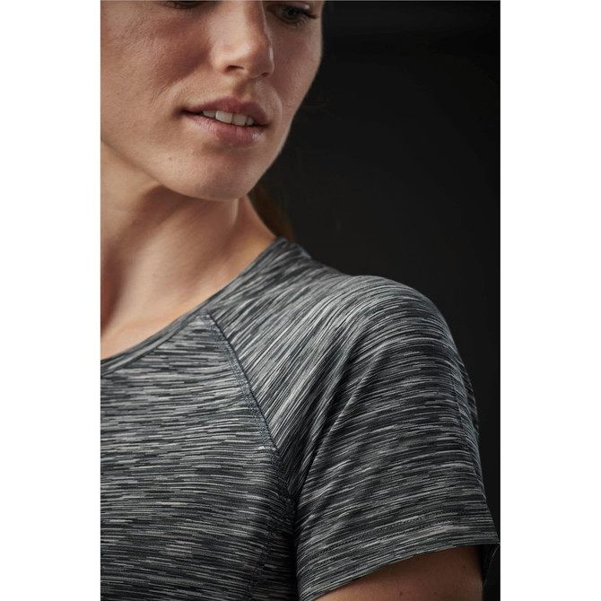 A close-up of a woman's shoulder wearing a grey marled Pacifica Tee with a fitted design and short sleeves.