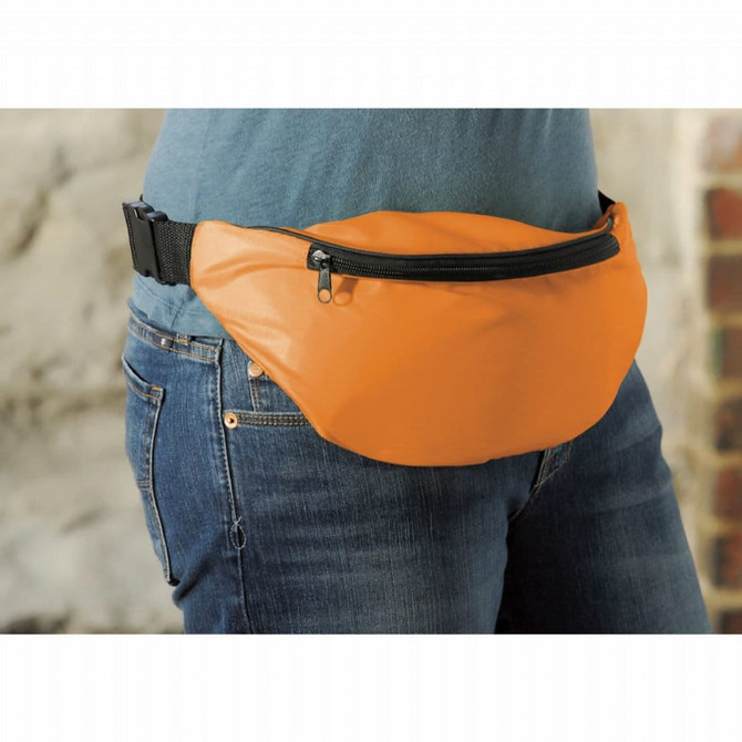 An orange fanny pack with a zippered compartment worn around the waist, featuring a buckle strap.