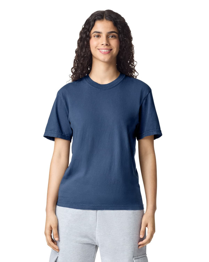 A navy heavyweight t-shirt for adults displayed on a model, featuring a simple design and a round neckline.
