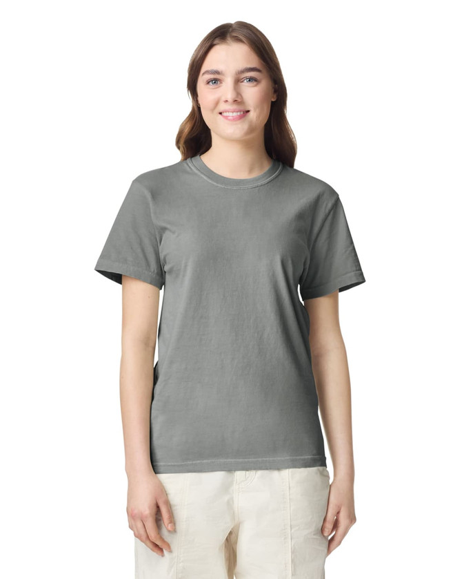 A grey heavyweight t-shirt displayed on a model, featuring a round neckline and short sleeves.