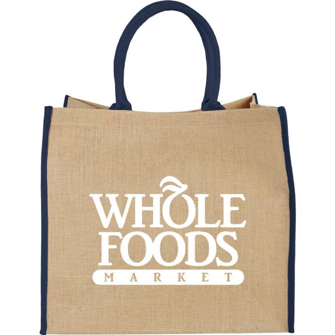 A large jute tote bag featuring a natural finish with navy blue handles and a logo.