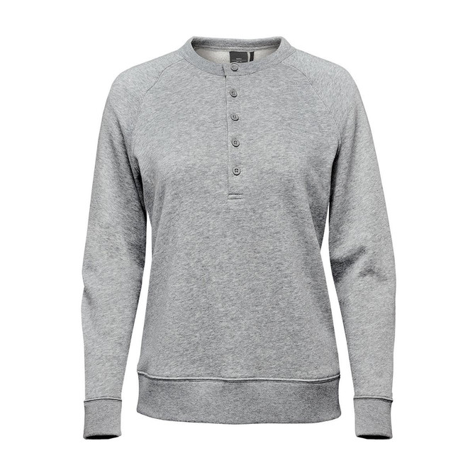 A women's grey Monashee Henley shirt featuring a button-up neck and long sleeves, with a logo on the label.