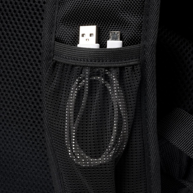 A black backpack featuring a mesh pocket containing USB and micro USB cables. It has a logo.