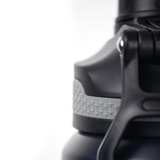 A drink bottle with a grey lid and textured grip, featuring a black body and a prominent attachment loop.