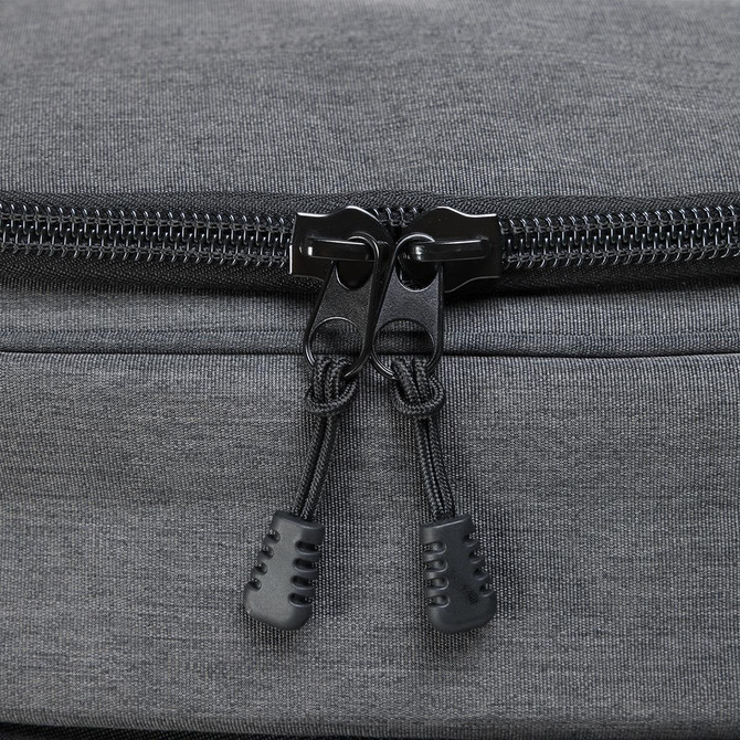 A grey backpack cooler featuring a double zip closure and black zipper pulls. It includes a logo.