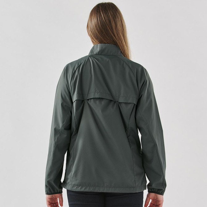 A woman wearing a dark grey full zip rain jacket viewed from the back, featuring a simple design and a logo.