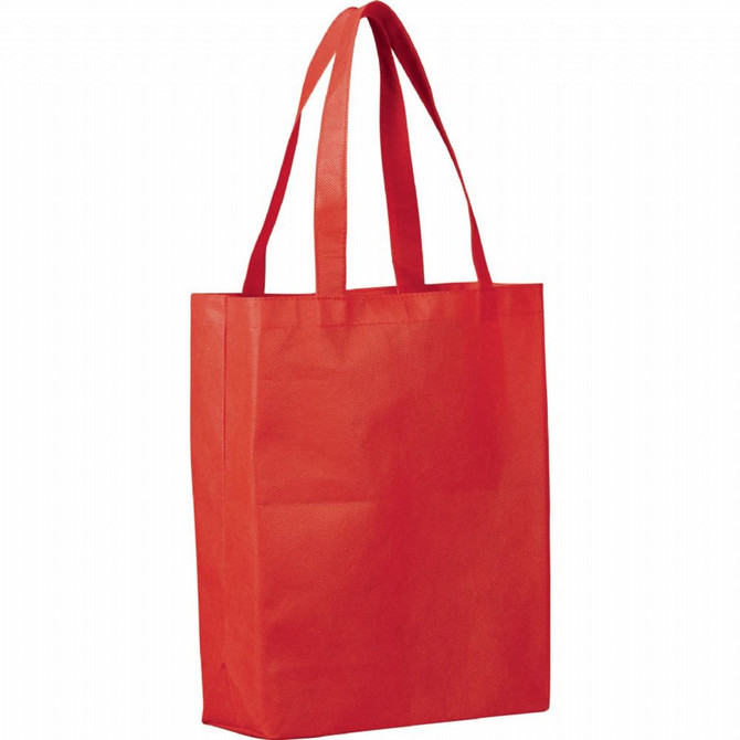 A red non-woven tote bag with two shoulder straps and a large rectangular body. It features a logo.