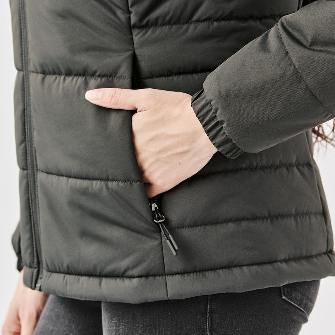 A women's dark green puffer jacket featuring a side pocket and quilted design. It has a fitted silhouette.