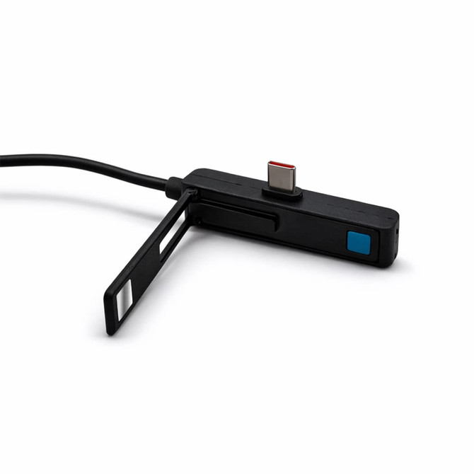 A black charging cable with a connector and a folding flap, featuring a blue button and a logo.