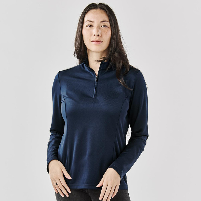 A women's 1/4 zip pullover in navy blue, featuring long sleeves and a subtle logo.