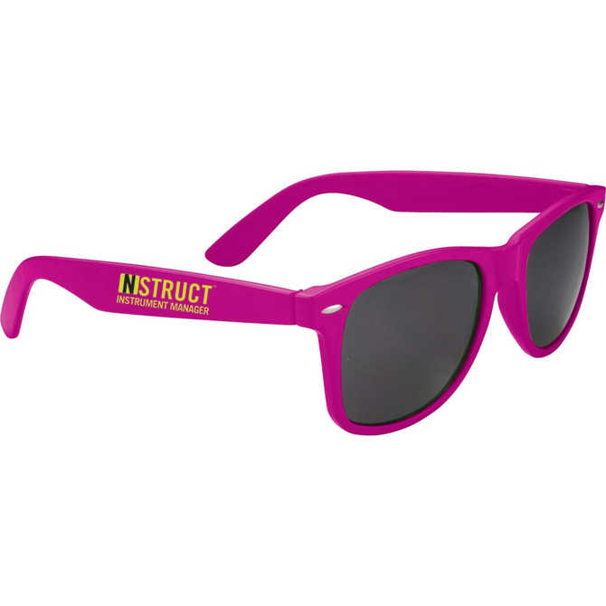 Bright pink sunglasses with dark lenses and a logo on one arm, part of the leisure and outdoors accessories.