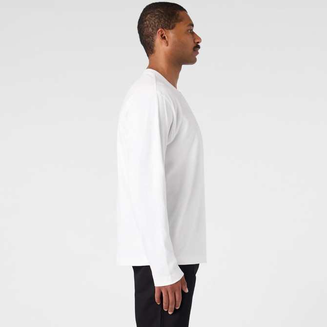 A white long-sleeve T-shirt displayed on a model from the side, featuring a logo on the garment.