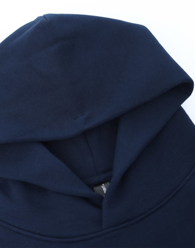 A navy unisex premium fleece oversized hoodie with a large hood and a branding label inside.