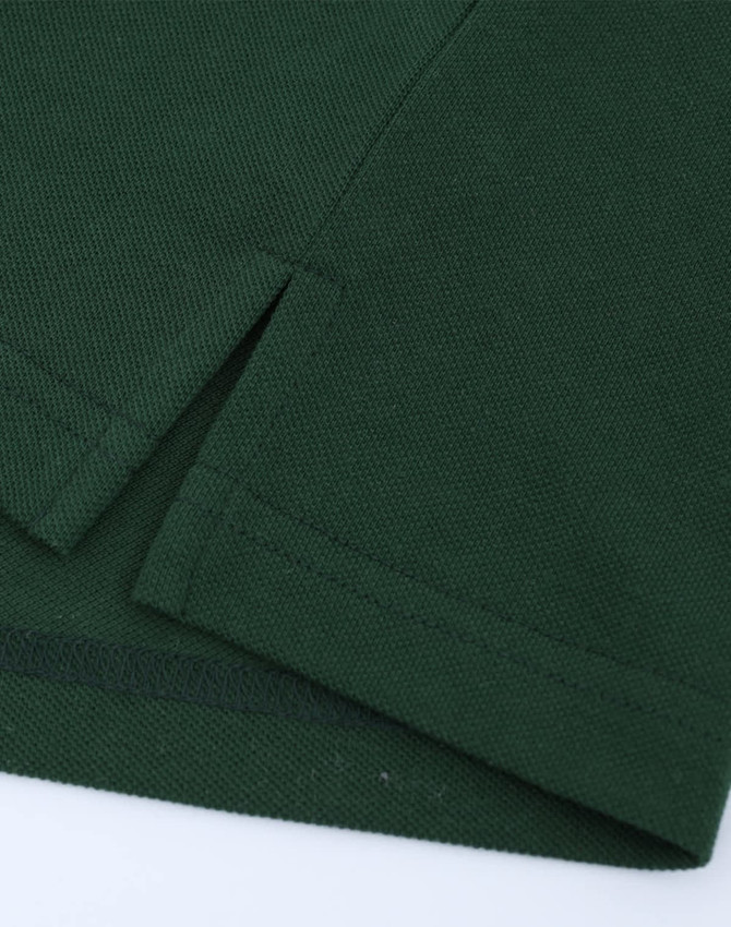 A green men's classic cotton/poly pique short-sleeve polo featuring side vents and a smooth finish.