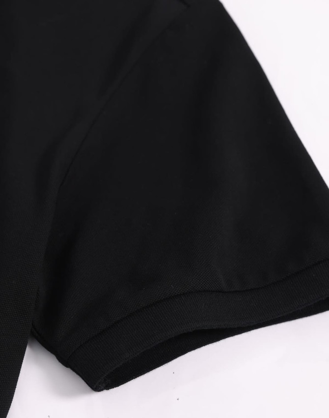 A black men's ultrafine cotton pique polo featuring short sleeves and a smooth texture, with a logo present.