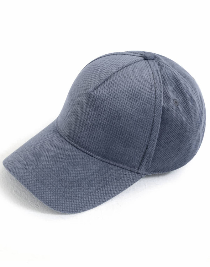 A navy blue Jacquard Texture 5 Panel Cap featuring a curved brim and a logo.