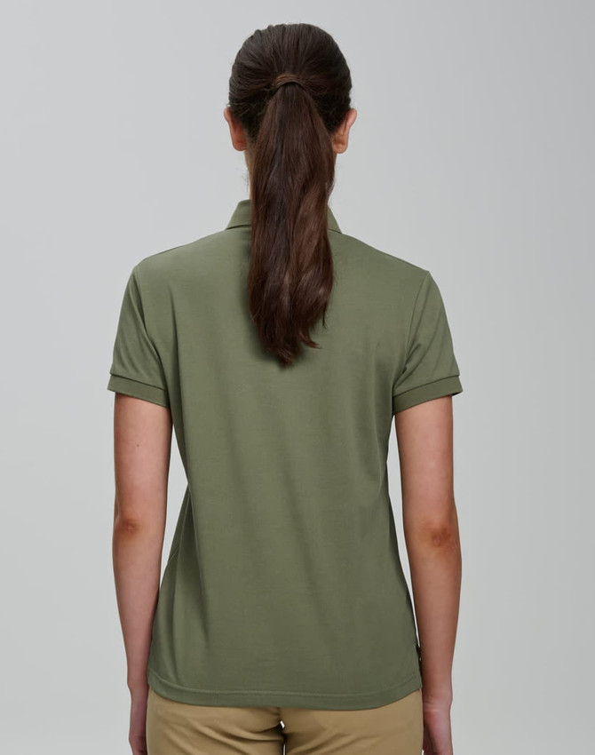 A women's olive green polo shirt with a classic cut and short sleeves, featuring a logo on the back.