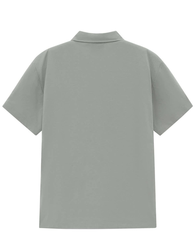 A men's high-performance polo in a muted green hue, featuring a collar and short sleeves. It has a logo on the back.