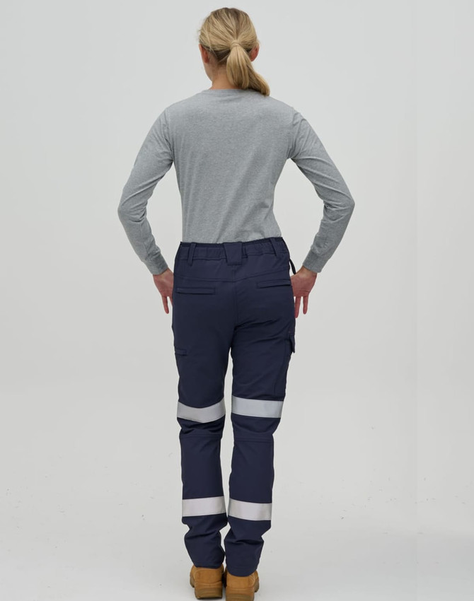 A pair of navy work pants with reflective tape, worn with a grey long-sleeve shirt, seen from the rear.
