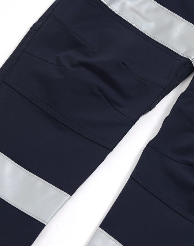 DWR water-repellent flexi work pants in navy with reflective tape accents. Features multiple pockets and a logo.
