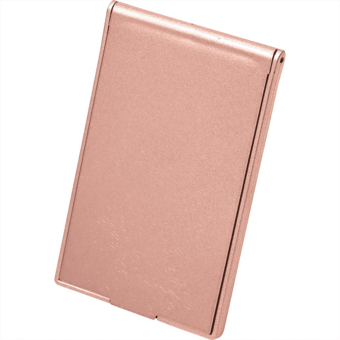 A rose gold pocket mirror with a sleek, compact design, featuring a reflective surface and a minimalist appearance.
