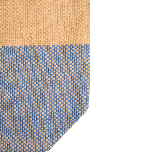 A large zipped tote in beige and blue, featuring a woven pattern with a logo on the side.