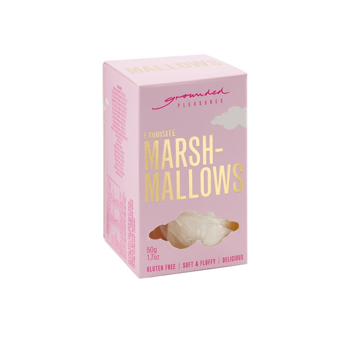A pink box containing exquisite marshmallows, featuring fluffy white treats inside. The box has a logo and gluten-free label.