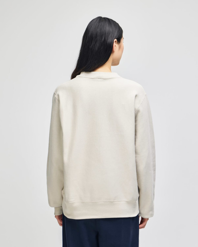 A grey Champion Reverse Weave® adult crew sweatshirt, viewed from the back, featuring a simple design and a branding logo.