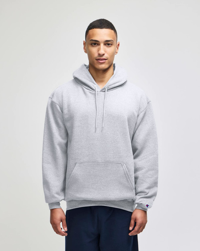 A grey pullover hooded sweatshirt with a front pocket, featuring a logo on the sleeve.